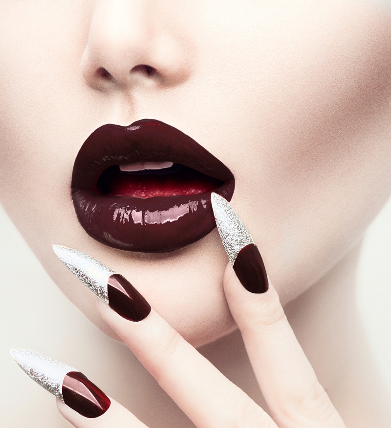 Makeup and Manicure. Red Long Nails and Red Glossy Lips. Sensual Mouth. Nail Art. Beautiful Sexy Lips. Fashion Model Woman Face. Professional Make-up. Perfect Skin