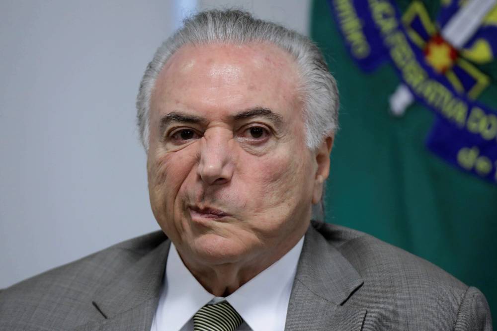 O presidente do Brasil, Michel Temer durante uma reunião para o anúncio de recursos para expansão e modernização do metrô de Brasília - 22/01/2018 (Ueslei Marcelino/Reuters)
