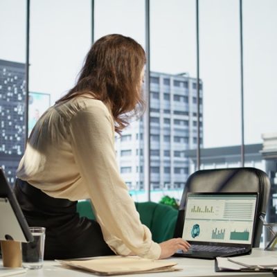 Female director demonstrates her management skills in a global enterprise, providing business deals and collaborations that align with the company vision and growth strategy. Camera B.